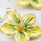 Boucles d'oreilles pendantes fleur jaune