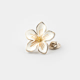 White flower pin