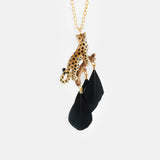 Leopard on branch necklace with feathers