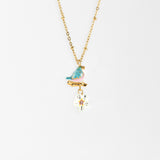 Bird on branch and flower necklace