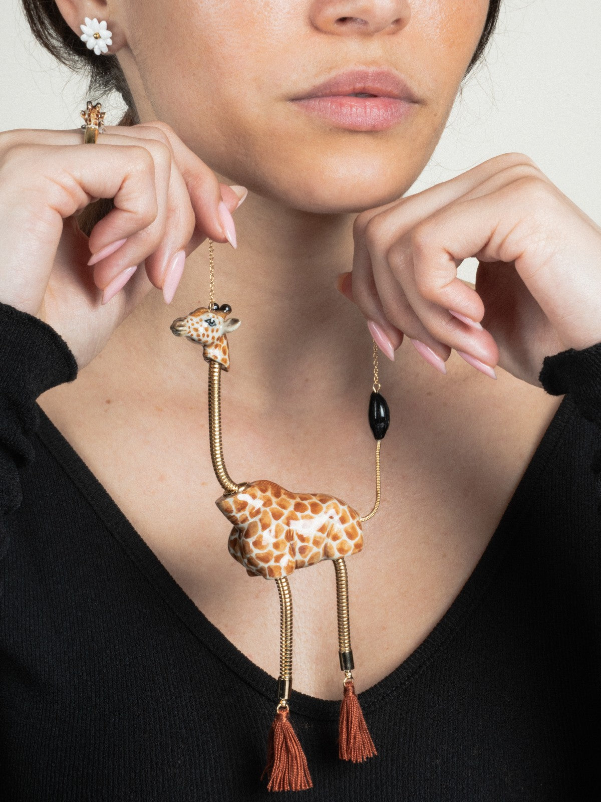 bague dorée avec girafe