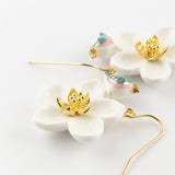 Boucles d'oreilles fleur blanche & oiseau bleu