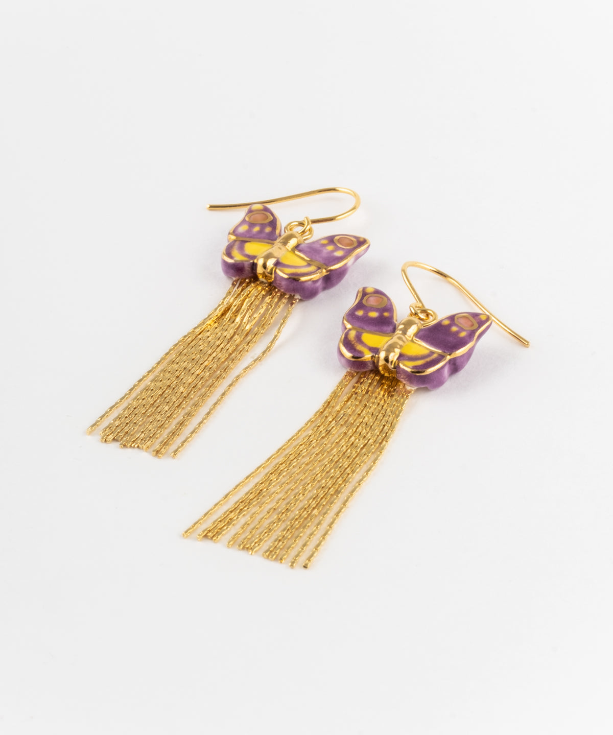 Boucles d'oreilles papillon violet à franges