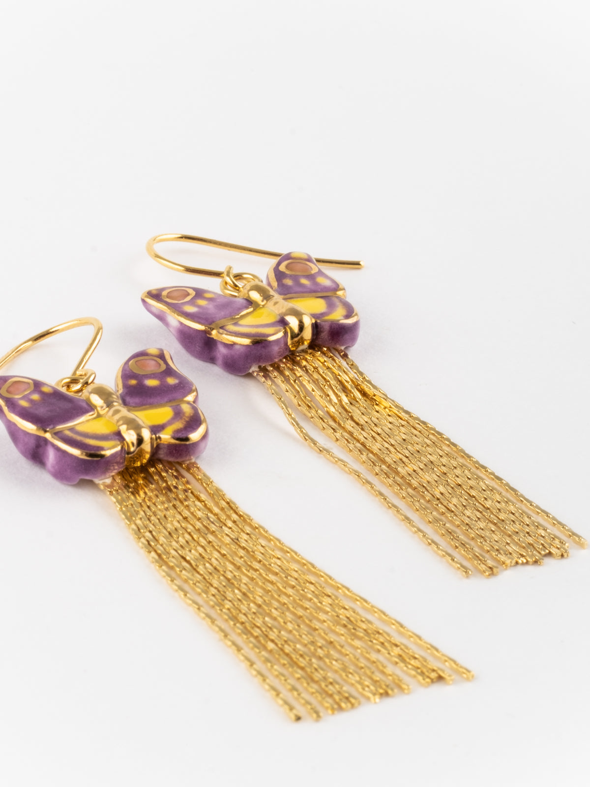 Boucles d'oreilles papillon violet à franges