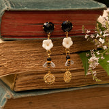 Boucles d'oreilles pendantes fleur et abeille