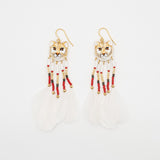 Boucles d'oreilles puma avec perles & plumes