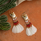 Boucles d'oreilles puma avec perles & plumes