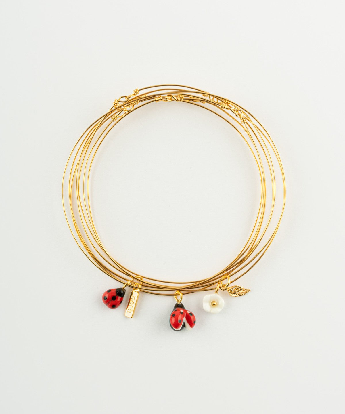 Bracelet semainier doré coccinelle