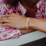 Bracelet twistband élastique orange guêpier