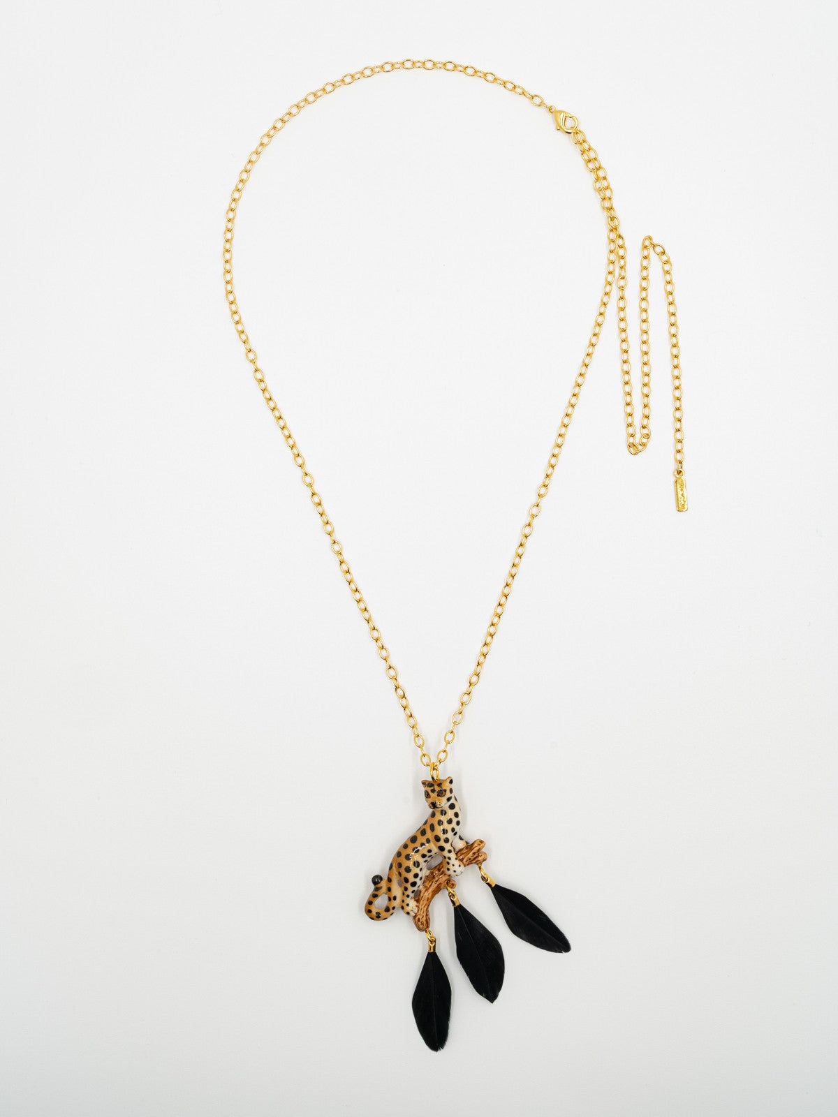 collier doré léopard plumes noires porcelaine