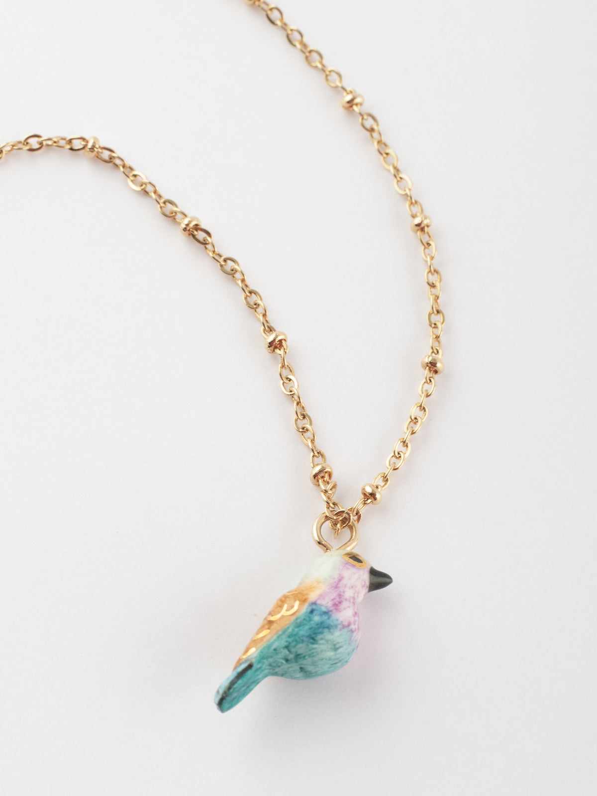 Collier oiseau rose et bleu