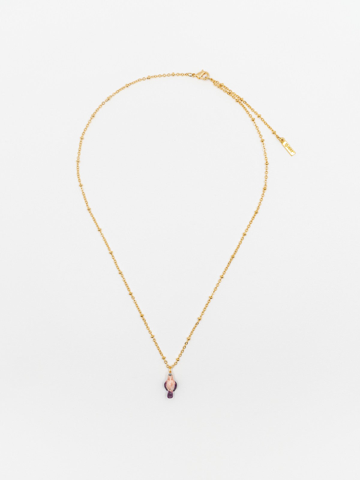 collier doré oiseau perroquet rose