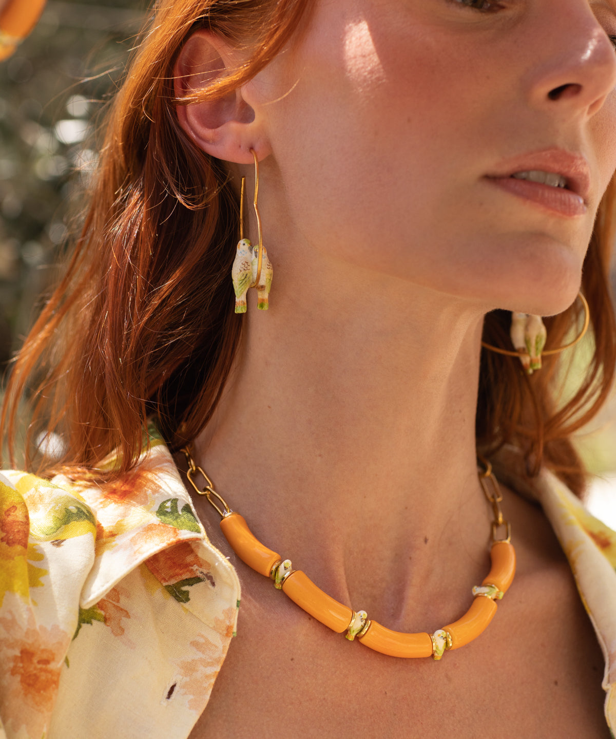 Collier perruches & perles oranges