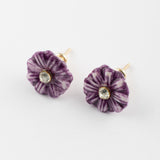 Petites puces d'oreilles chardon violet