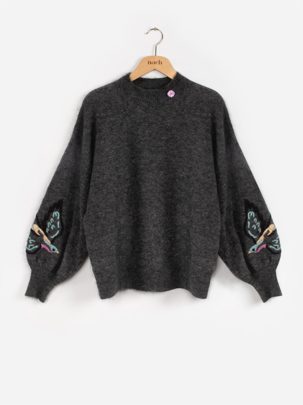 Pull en maille avec oiseau brodé